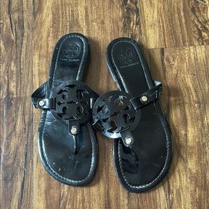 Tory Burch Black Sandals with Flower Embellishment